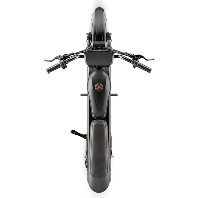 Top-down view of the iScooter DX5 Max electric bike, highlighting its wide saddle seat, handlebar layout, central frame design, and compact fat-tire construction on a white background.