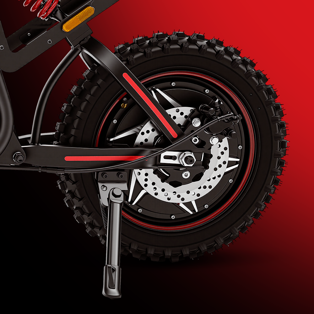 Close-up of the iScooter DX5 Max rear wheel featuring a wide knobby off-road tire, ventilated disc brake rotor, rear braking system, and side kickstand. The image highlights the bike’s rugged tire tread and durable components for all-terrain riding.