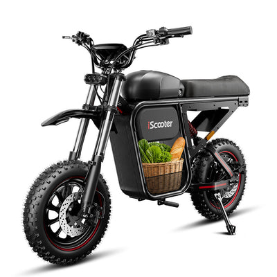 A studio product image of a black electric bike on a white background. The bike features fat all-terrain tires, front suspension forks, disc brakes, and a long cushioned seat. A basket filled with fresh vegetables and a loaf of bread is displayed inside the bike’s central cargo compartment, demonstrating its utility for grocery shopping and everyday transport. The image highlights the bike’s practical storage capacity and versatility for daily errands.